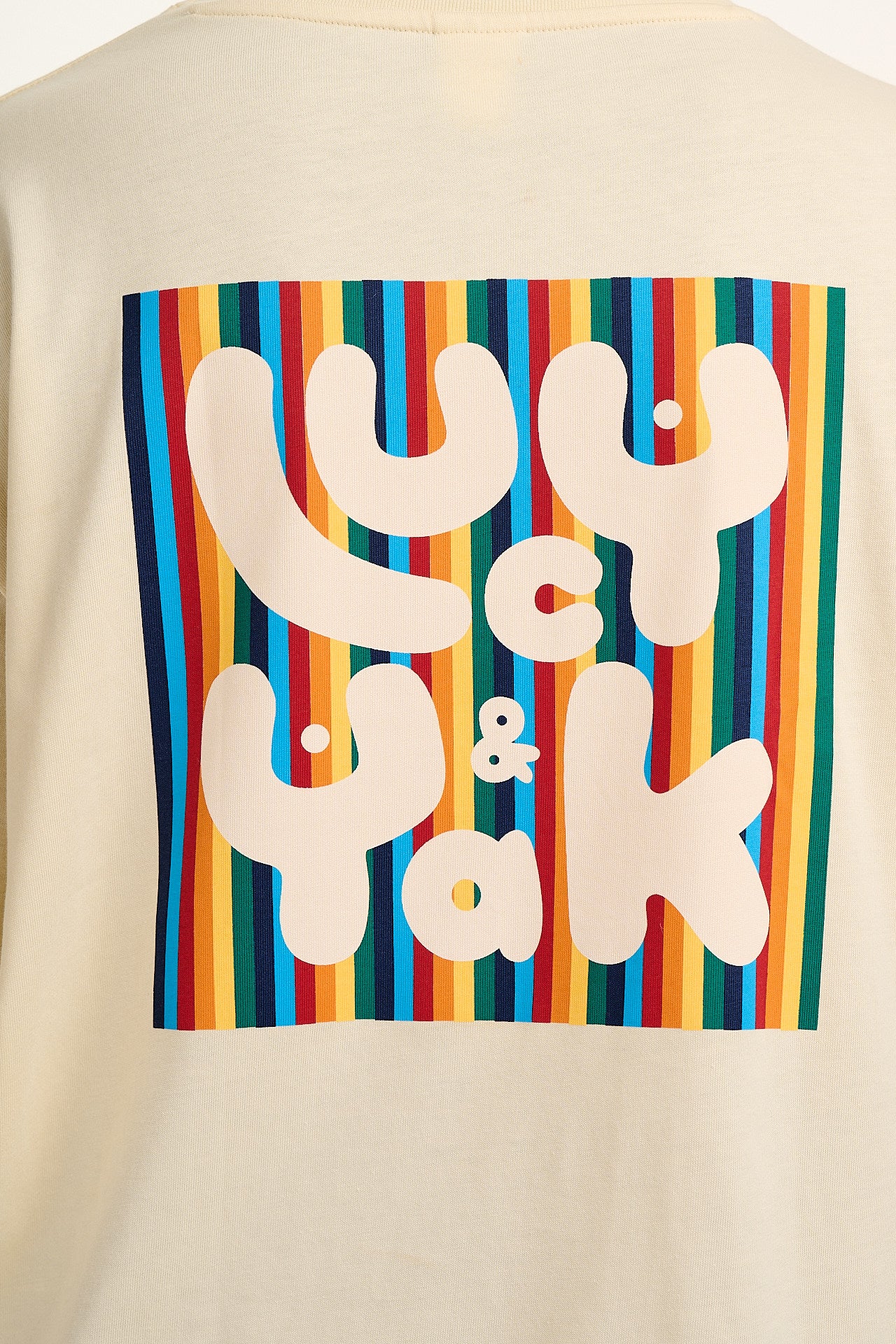 Benny - Organic Cotton Tee in Ecru with Logo Rainbow Stripe Print - Image 3